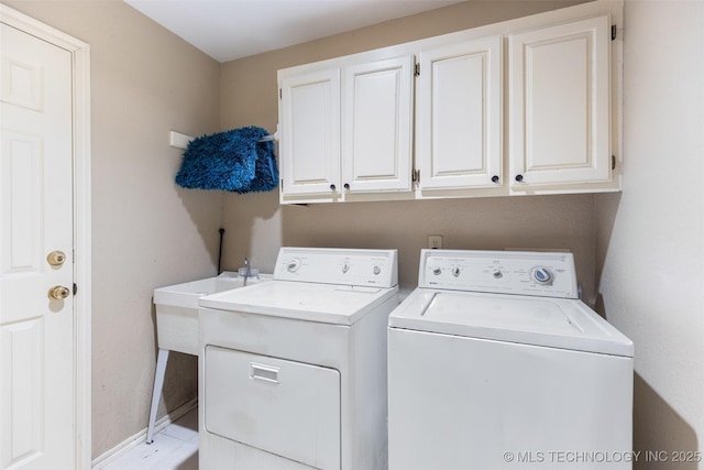 5446 E 88th St, Tulsa, OK 74137 - washroom with separate washer and dryer, cabinet space, and baseboards