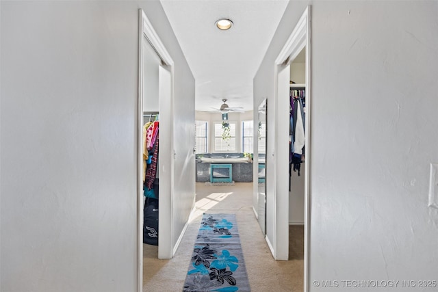 5446 E 88th St, Tulsa, OK 74137 - hallway with light colored carpet and baseboards