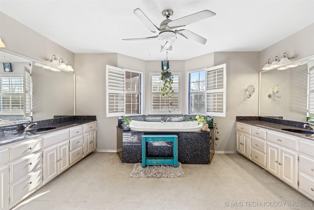 5446 E 88th St, Tulsa, OK 74137 - full bath featuring a ceiling fan, baseboards, and plenty of natural light