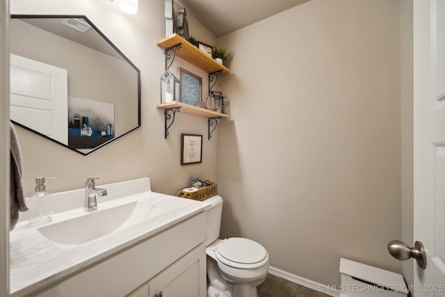 3854 E 144th St S, Bixby, OK 74008 - half bath featuring toilet, vanity, tile patterned flooring, and baseboards
