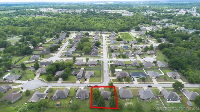 29901 E 137th Pl, Coweta, OK 74429 - aerial view of property and surrounding area featuring property parcel outlined and nearby suburban area
