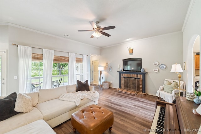 29901 E 137th Pl, Coweta, OK 74429 - living area featuring ceiling fan, a fireplace, wood finished floors, crown molding, and baseboards