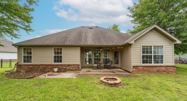 29901 E 137th Pl, Coweta, OK 74429 - rear view of property featuring brick siding, a fire pit, a patio area, and roof with shingles