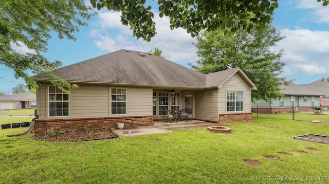 29901 E 137th Pl, Coweta, OK 74429 - rear view of property with brick siding, a patio, a shingled roof, and a fire pit