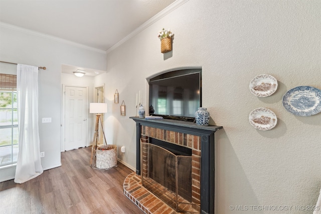 29901 E 137th Pl, Coweta, OK 74429 - living room with crown molding, wood finished floors, a brick fireplace, and baseboards