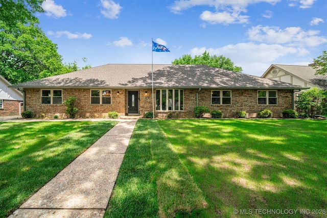 6123 E 53rd St, Tulsa, OK 74135 - view of front facade with a front lawn, brick siding, and a shingled roof