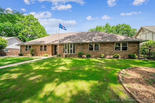 6123 E 53rd St, Tulsa, OK 74135 - single story home featuring brick siding, a front lawn, and a shingled roof