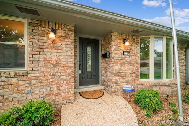 6123 E 53rd St, Tulsa, OK 74135 - entrance to property featuring brick siding and covered porch
