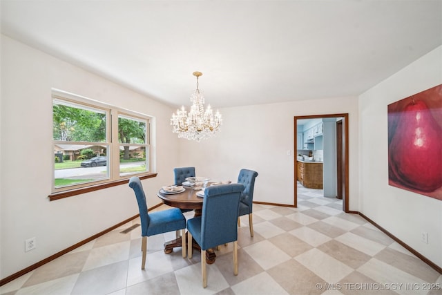 6123 E 53rd St, Tulsa, OK 74135 - dining room featuring a chandelier and light flooring