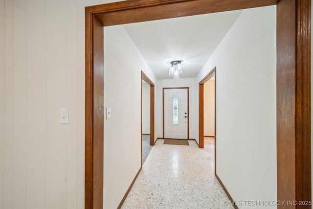 6123 E 53rd St, Tulsa, OK 74135 - hall featuring dark speckled floor and baseboards