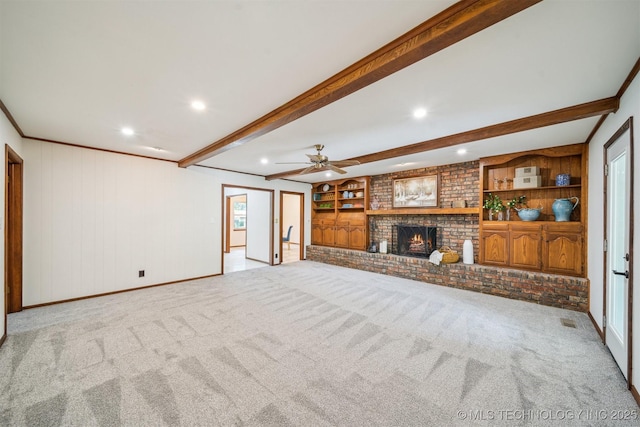 6123 E 53rd St, Tulsa, OK 74135 - unfurnished living room featuring carpet floors, beam ceiling, a brick fireplace, recessed lighting, and ceiling fan