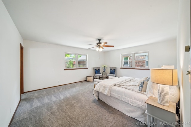 6123 E 53rd St, Tulsa, OK 74135 - carpeted bedroom featuring baseboards and a ceiling fan