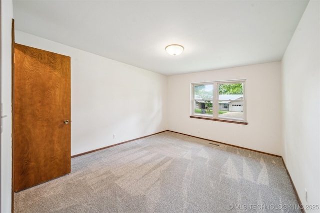 6123 E 53rd St, Tulsa, OK 74135 - unfurnished room featuring carpet