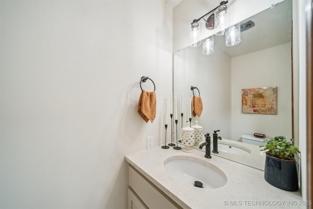 6123 E 53rd St, Tulsa, OK 74135 - bathroom with vanity and toilet