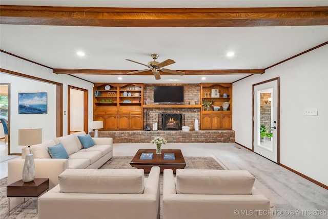 6123 E 53rd St, Tulsa, OK 74135 - living room with beamed ceiling, ceiling fan, a brick fireplace, recessed lighting, and carpet flooring