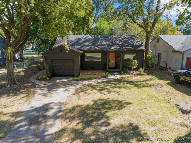 4907 S Boston Ave, Tulsa, OK 74105 - view of front of house with an attached garage and concrete driveway