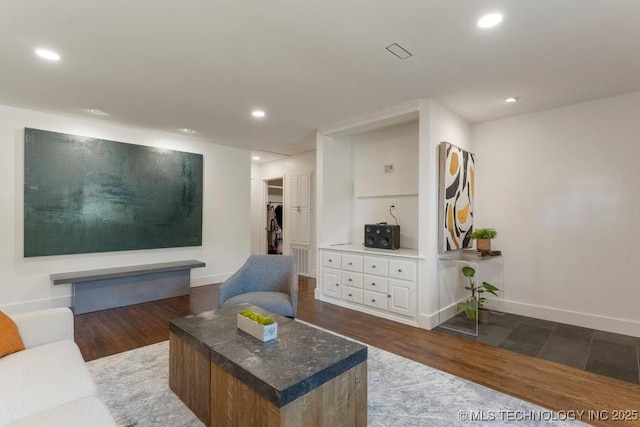 4907 S Boston Ave, Tulsa, OK 74105 - living room featuring dark wood-style floors, baseboards, and recessed lighting