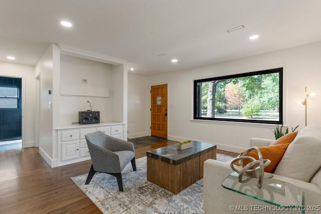 4907 S Boston Ave, Tulsa, OK 74105 - living room with dark wood finished floors, baseboards, and recessed lighting