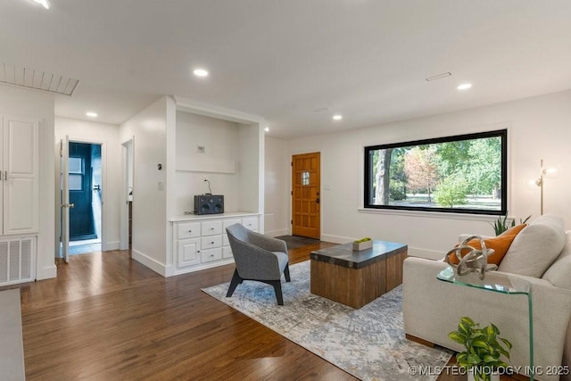 4907 S Boston Ave, Tulsa, OK 74105 - living area with dark wood finished floors, recessed lighting, and baseboards