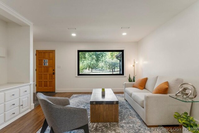 4907 S Boston Ave, Tulsa, OK 74105 - living room with dark wood finished floors, baseboards, and recessed lighting