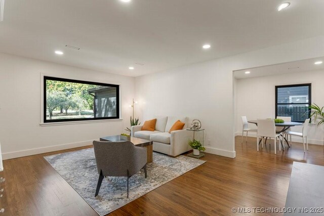 4907 S Boston Ave, Tulsa, OK 74105 - living room with wood finished floors, recessed lighting, and baseboards
