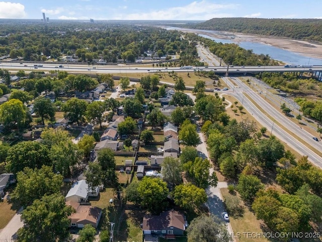4907 S Boston Ave, Tulsa, OK 74105 - aerial view of property and surrounding area featuring a major roadway, nearby suburban area, and a large body of water