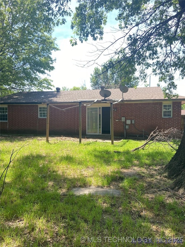 10813 E 34th Pl, Tulsa, OK 74146 - rear view of property with brick siding