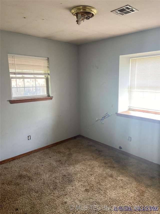 10813 E 34th Pl, Tulsa, OK 74146 - carpeted empty room featuring baseboards