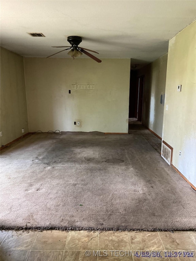 10813 E 34th Pl, Tulsa, OK 74146 - carpeted empty room featuring a ceiling fan and baseboards