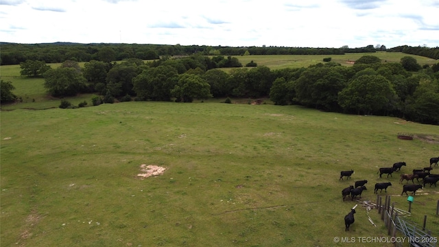 aerial overview of property's location with rural landscape and a pastoral area