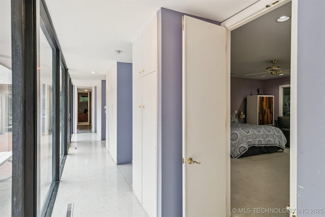 3219 S Birmingham Ave, Tulsa, OK 74105 - hallway featuring dark speckled floor and recessed lighting
