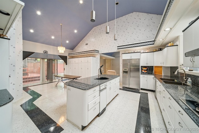 3219 S Birmingham Ave, Tulsa, OK 74105 - kitchen featuring stainless steel refrigerator with ice dispenser, a sink, white cabinetry, a kitchen island with sink, and high vaulted ceiling