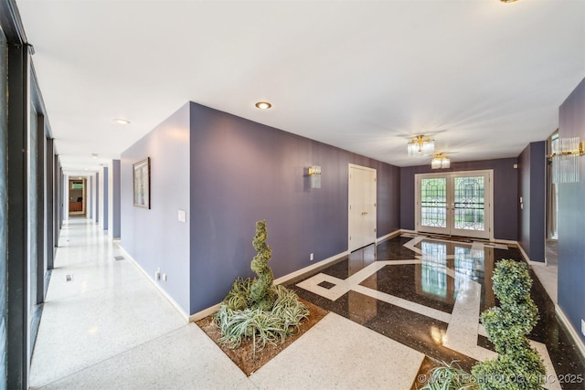 3219 S Birmingham Ave, Tulsa, OK 74105 - hall featuring baseboards, recessed lighting, speckle patterned floor, and inlaid floor details