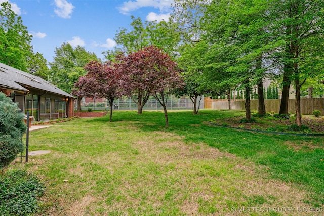 3219 S Birmingham Ave, Tulsa, OK 74105 - view of yard featuring a sunroom