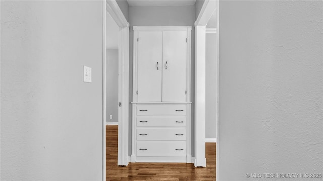 711 N SW, Ardmore, OK 73401 - hall with wood finished floors and baseboards