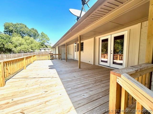 711 N SW, Ardmore, OK 73401 - deck with french doors