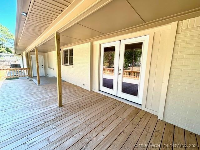 711 N SW, Ardmore, OK 73401 - wooden terrace featuring french doors