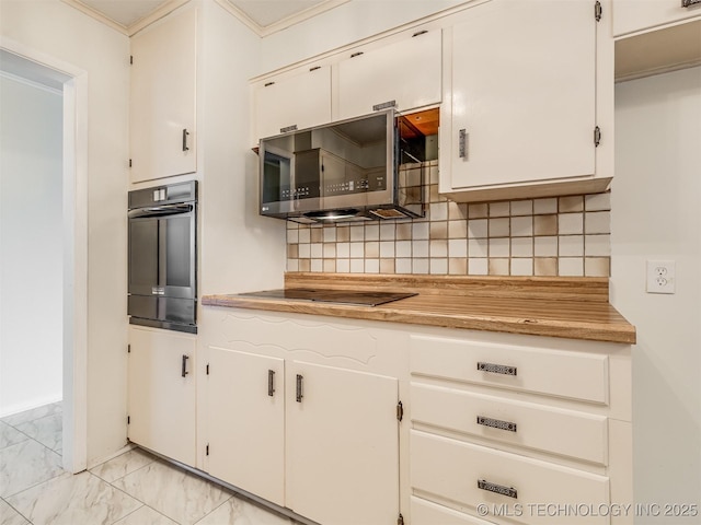 kitchen with black appliances, light marble finish flooring, light countertops, decorative backsplash, and crown molding