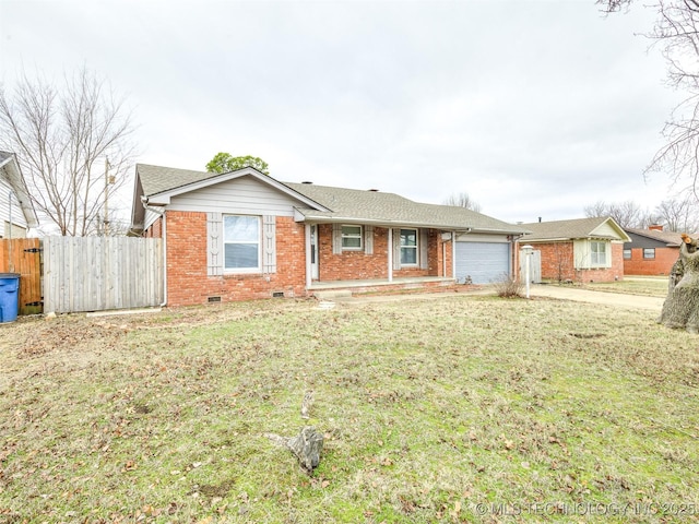 ranch-style house with an attached garage, brick siding, crawl space, driveway, and a shingled roof