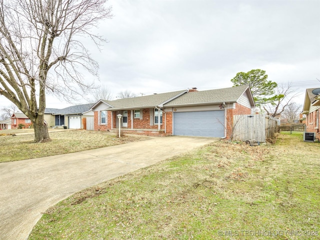 ranch-style house featuring brick siding, an attached garage, cooling unit, concrete driveway, and roof with shingles