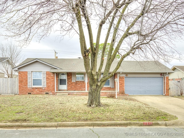 ranch-style home featuring brick siding, concrete driveway, an attached garage, roof with shingles, and crawl space