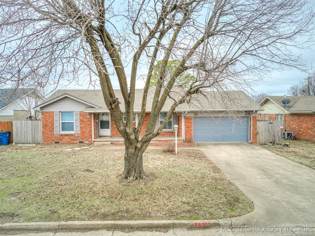 ranch-style house with brick siding, driveway, an attached garage, crawl space, and a shingled roof