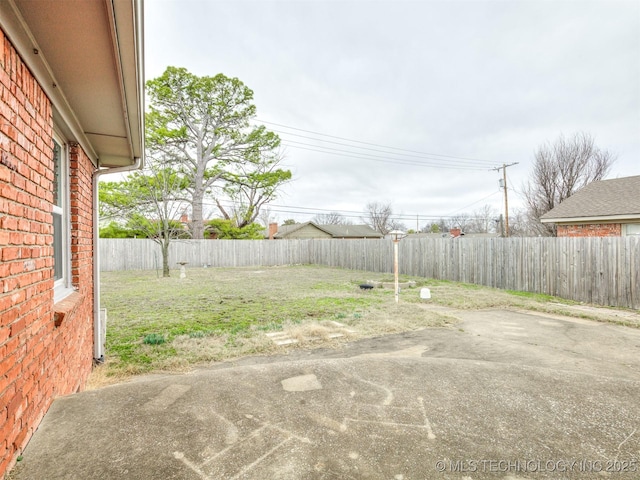 view of yard featuring fence