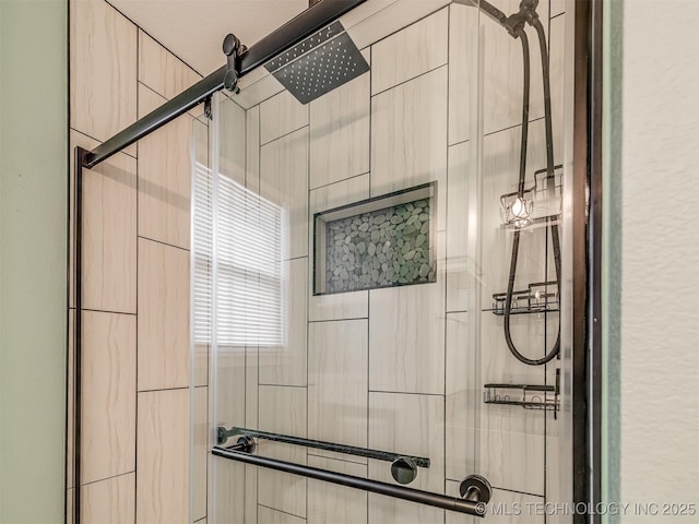full bathroom with a shower stall