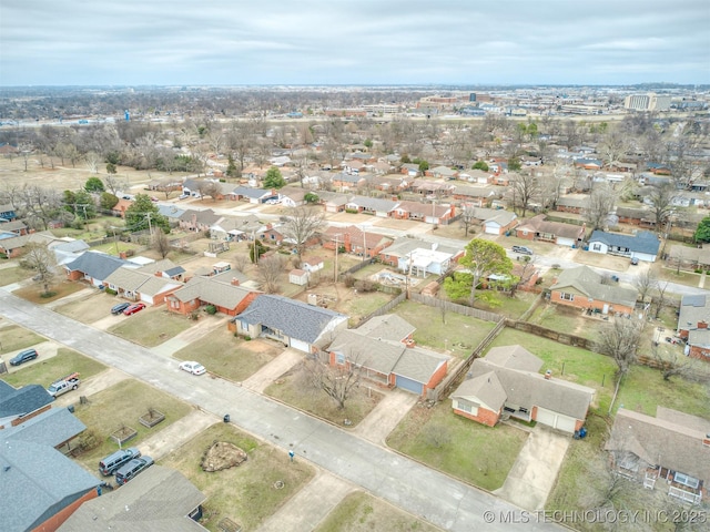 aerial view of property's location featuring nearby suburban area