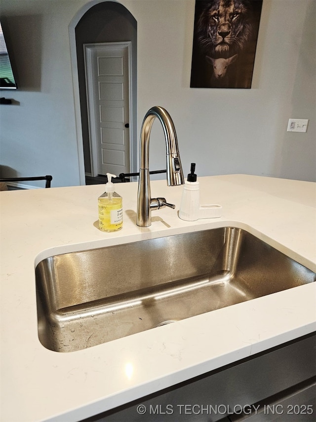 2721 S 8th St E, Broken Arrow, OK 74012 - kitchen view of light countertops and arched walkways