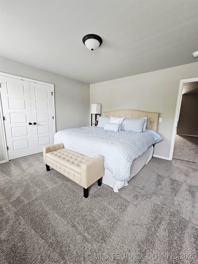 2721 S 8th St E, Broken Arrow, OK 74012 - carpeted bedroom featuring a closet and baseboards