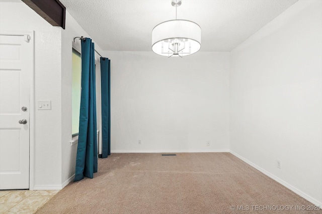 3719 E 84th St, Tulsa, OK 74137 - carpeted empty room with a textured ceiling and baseboards