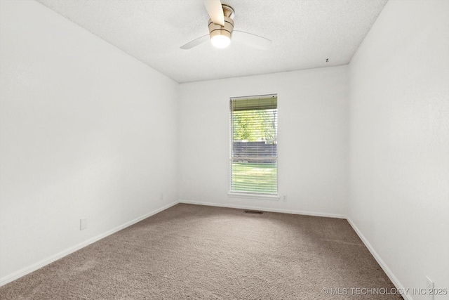 3719 E 84th St, Tulsa, OK 74137 - unfurnished room featuring carpet, baseboards, ceiling fan, and a textured ceiling