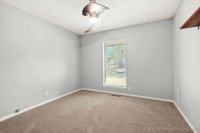 3719 E 84th St, Tulsa, OK 74137 - empty room with carpet, a textured ceiling, and baseboards